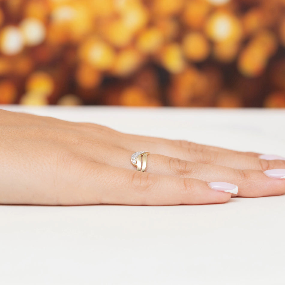 Zlatý prsteň so zirkónmi vlnky