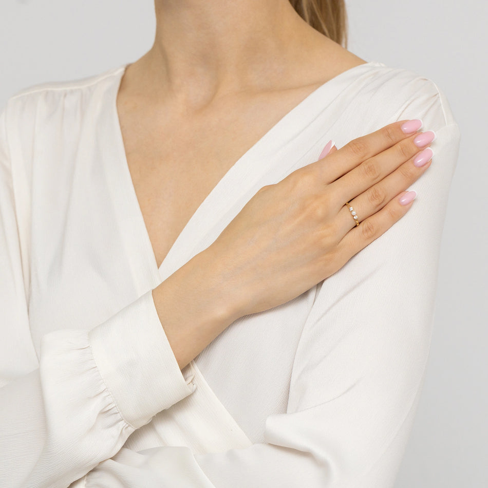 Zlatý prsteň s perlou a zirkóniou