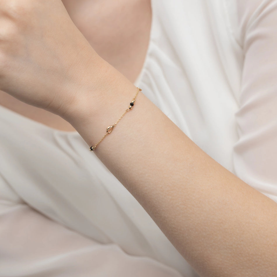 Gold Bracelet with Hearts, Beads and Black Stones