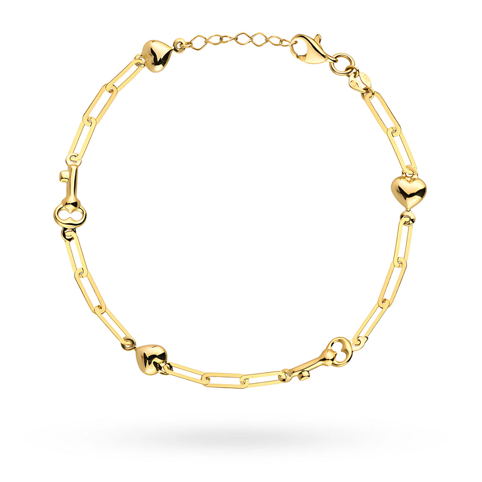 Zlatý náramok s kľúčmi a srdiečkami, široké očká