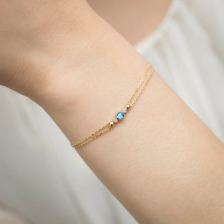 Gold Bracelet with 0.15ct Topaz and 0.029ct Diamonds