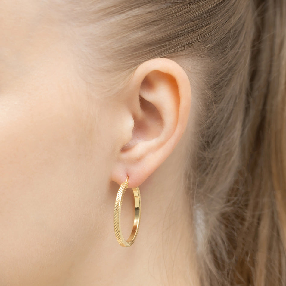 Pozlátené strieborné kruhové zásuvacie náušnice