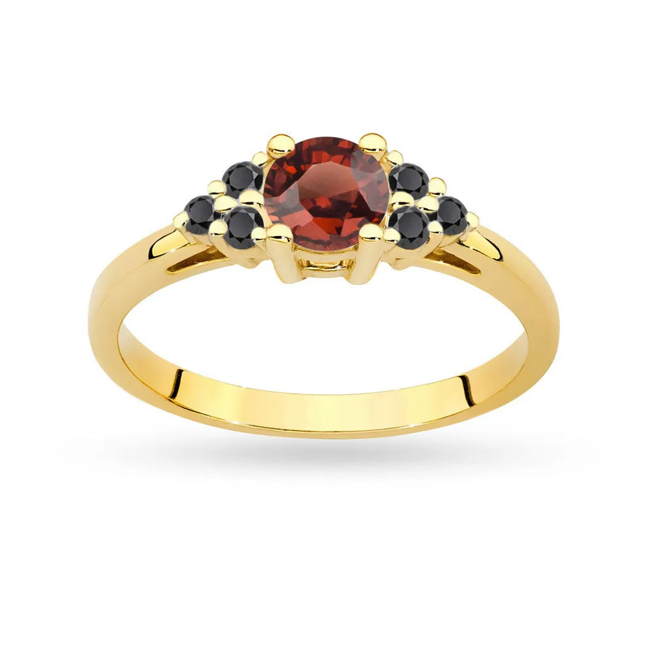 Gold Ring with 0,60ct Garnet and 6 Black Diamonds