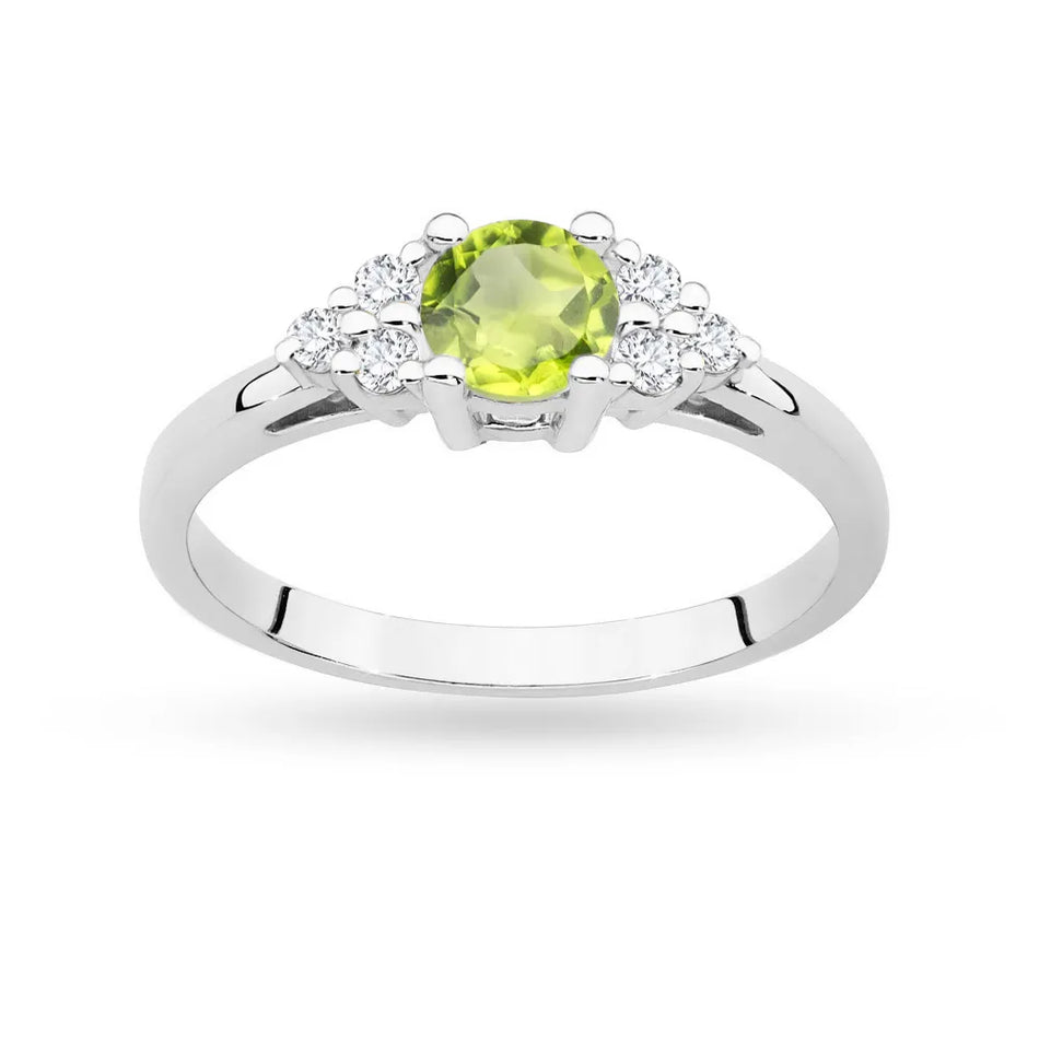 Gold Ring with 0,60ct Olivine and 6 Diamonds