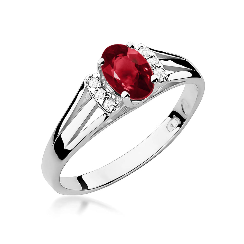 Zlatý prsteň s 0,50 ct granátom a 0,052 ct diamantmi