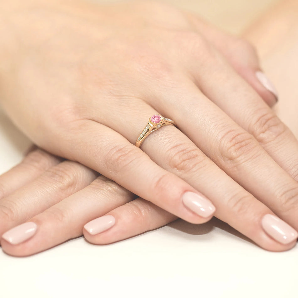 gold-ring-with-0-30ct-pink-topaz-and-0-103ct-diamonds-w0016-top-01