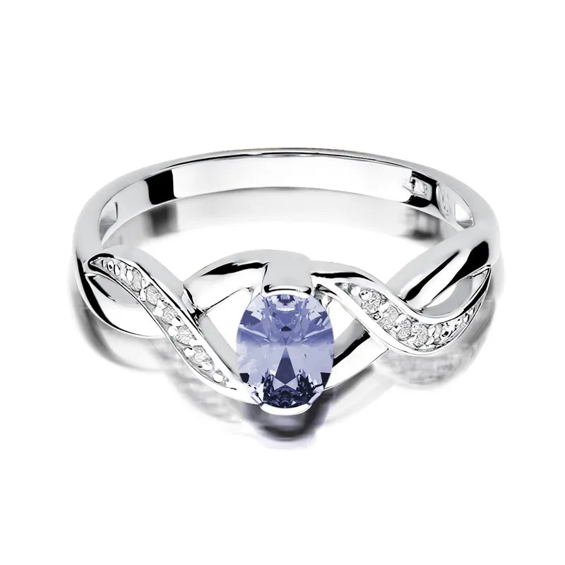 Zlatý prsteň s 0,40 ct tanzanitom a 0,05 ct diamantmi