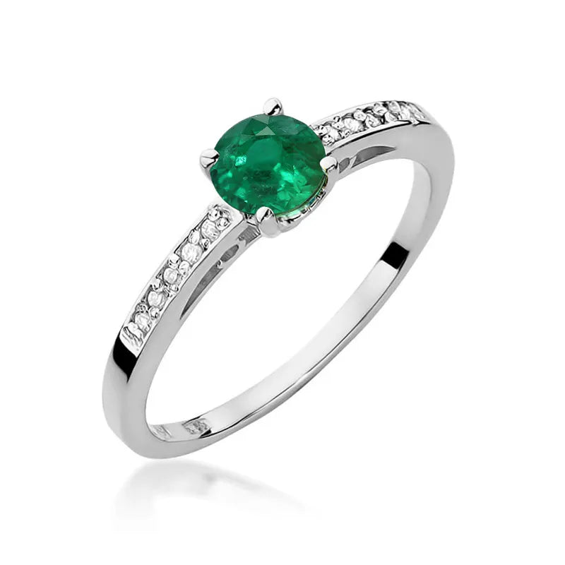 Zlatý prsteň s 0,50 ct smaragdom a 0,05 ct diamantmi