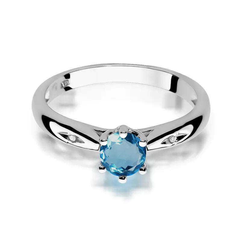 Zlatý prsteň s 0,50 ct topásom London Blue a 0,01 ct diamantmi