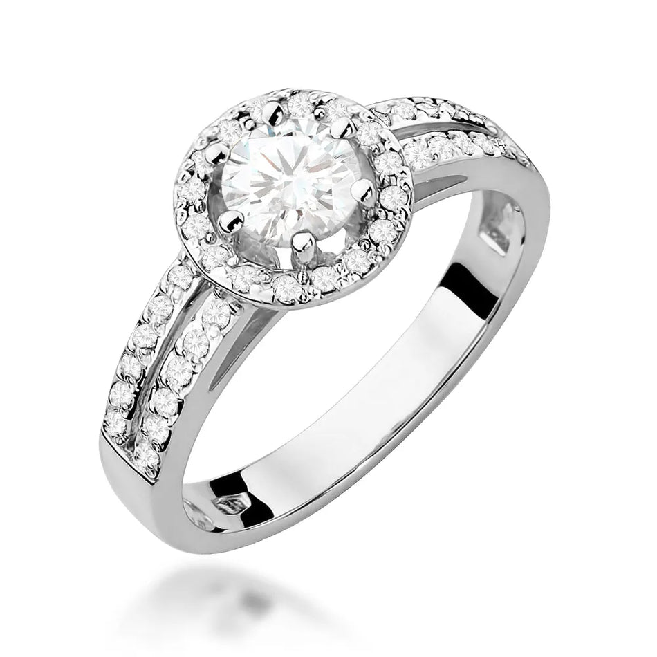 Zlatý prsteň s 0,60 ct bielym zafírom a 0,20 ct diamantmi