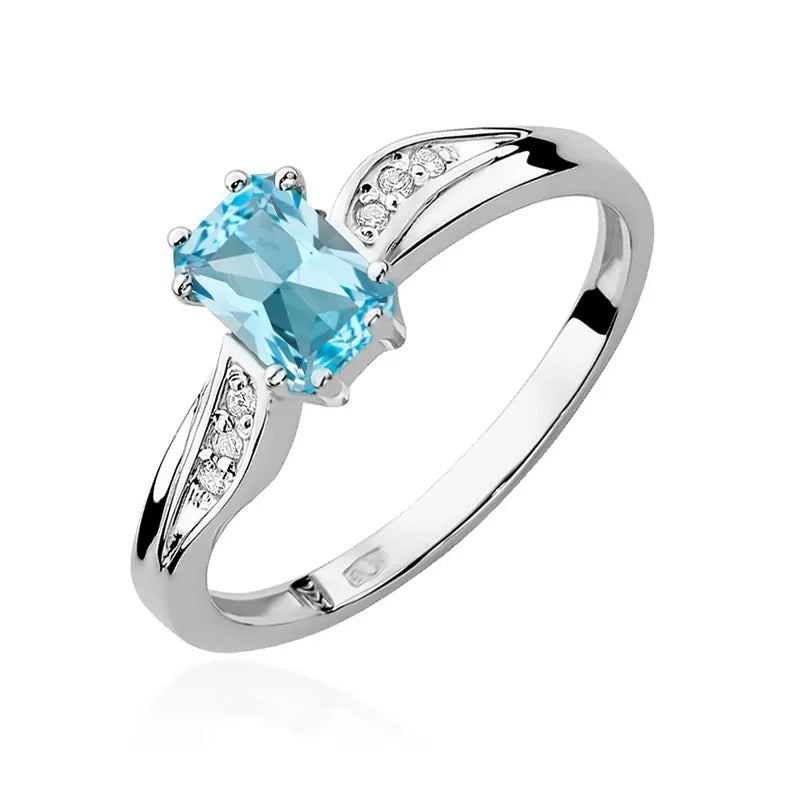 Zlatý prsteň s topásom 0,65 ct a diamantmi 0,03 ct