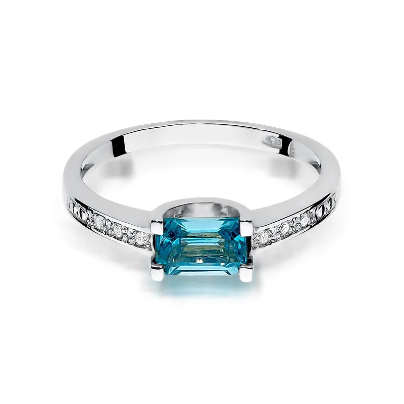 Zlatý prsteň s topásom 0,65 ct a diamantmi 0,03 ct