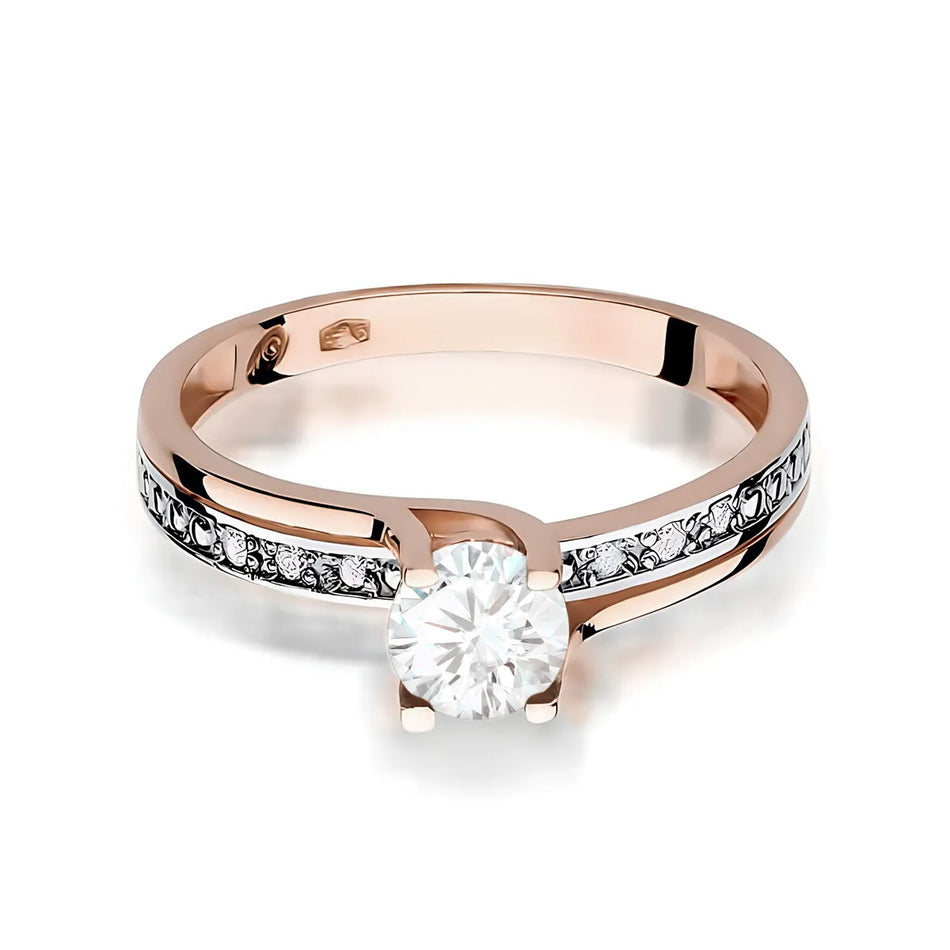 Zlatý prsteň s 0,60 ct bielym zafírom a 0,03 ct diamantmi