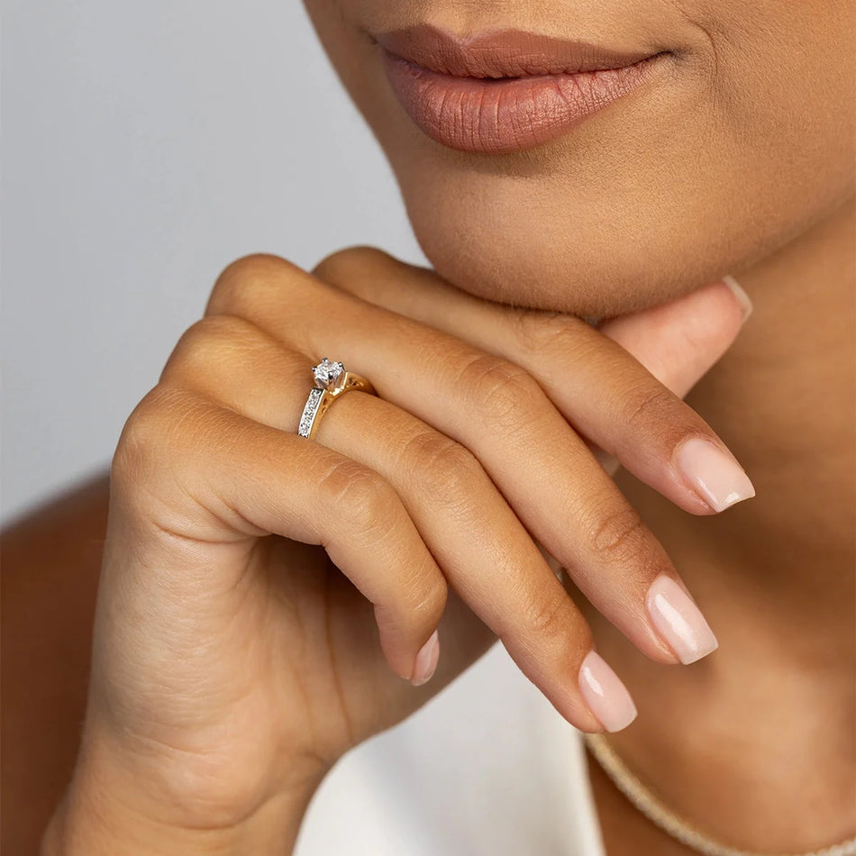 Zlatý prsteň s diamantmi 0,30 ct a 0,116 ct