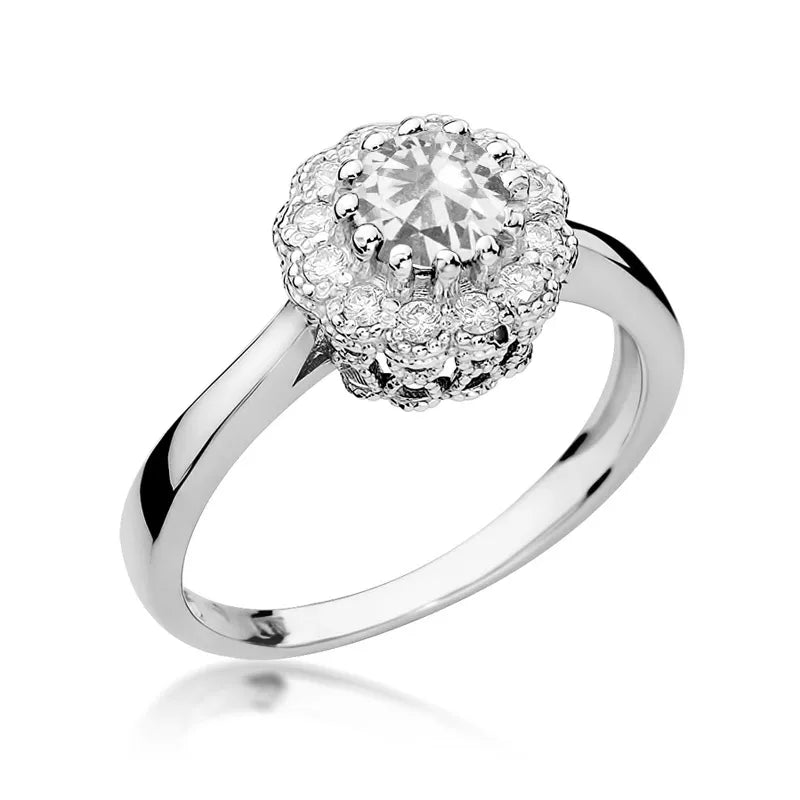 Zlatý prsteň s 0,60 ct bielym zafírom a 0,174 ct diamantmi