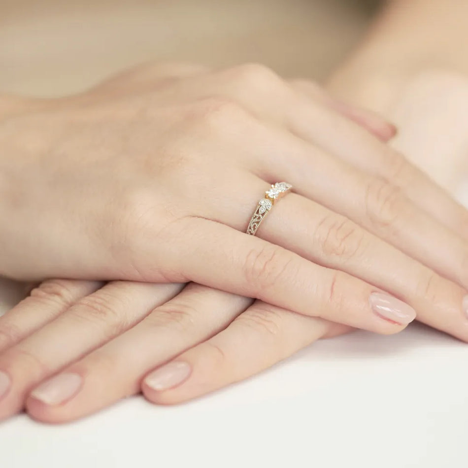 Gold Ring with 0.10ct and 0.03ct Diamonds