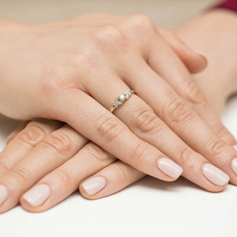 Gold Ring with 0.10ct and 0.02ct Diamonds