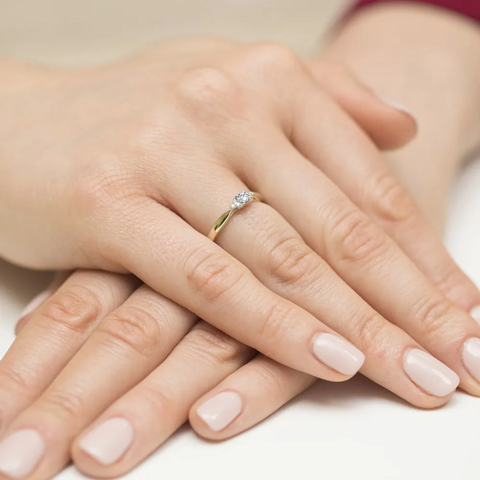 Gold Ring with 0.10ct and 0.03ct Diamonds