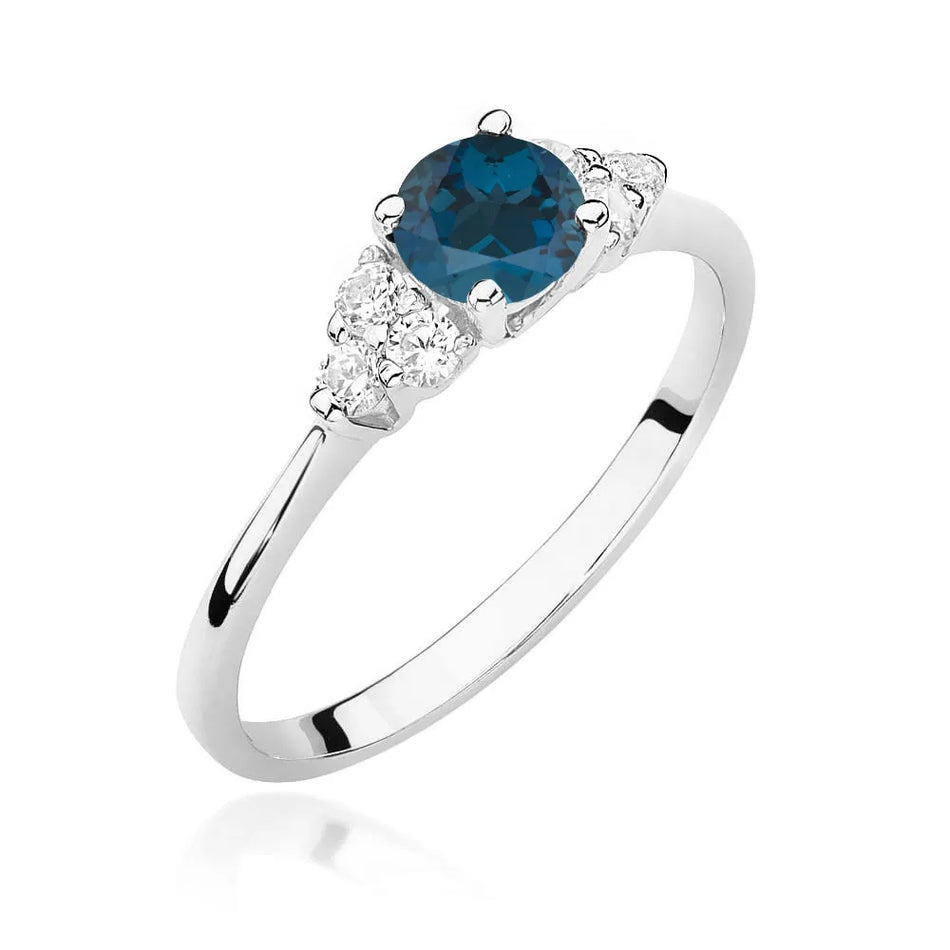 Zlatý prsteň s 0,50 ct topásom London Blue a 0,18 ct diamantmi