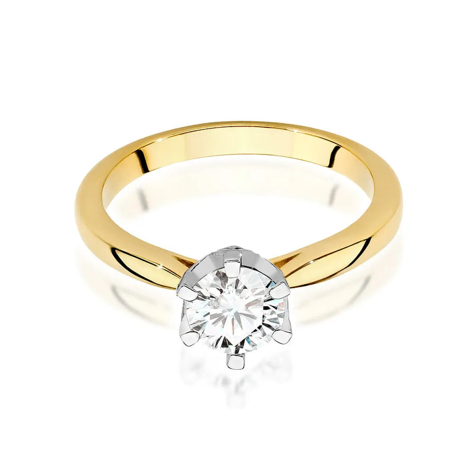Gold Ring with 0.70ct Diamond and 0.06ct Sideline Diamonds