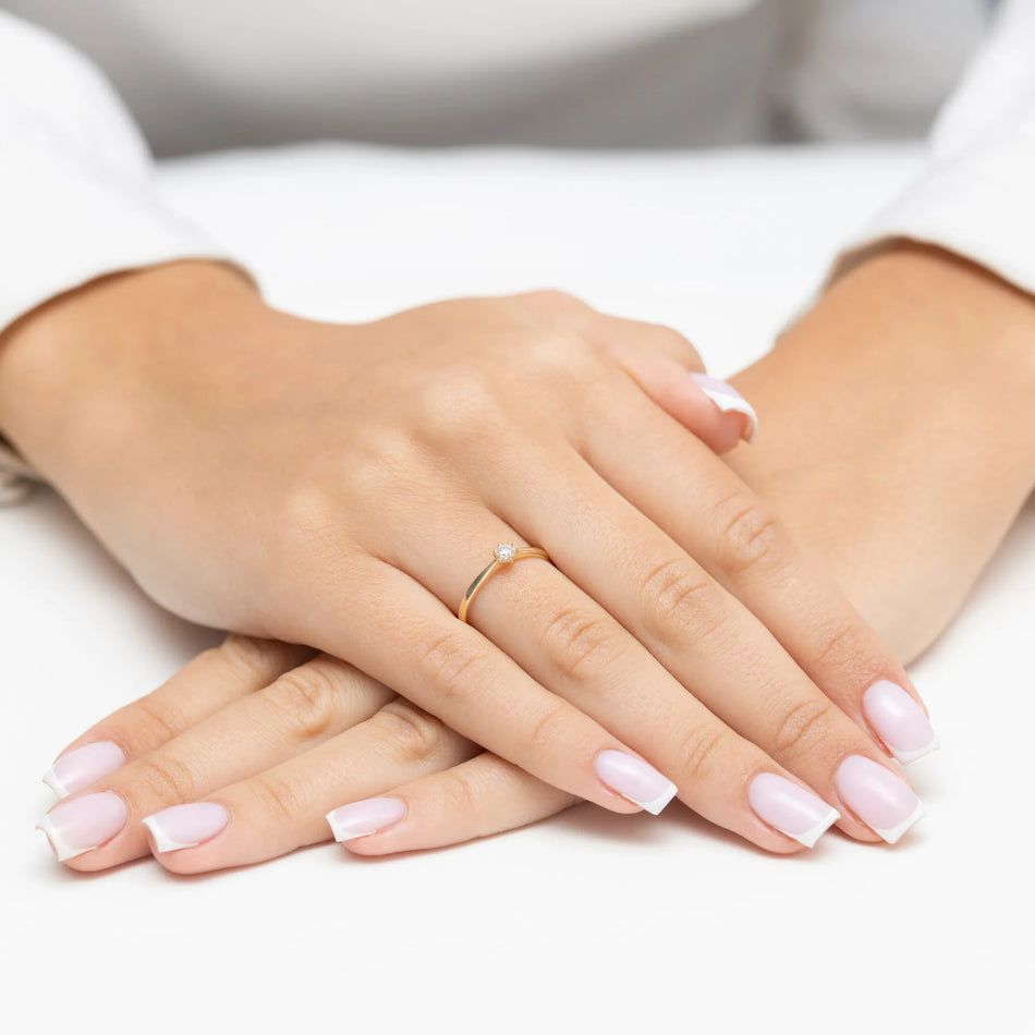 Zlatý prsteň s diamantom 0,10 ct