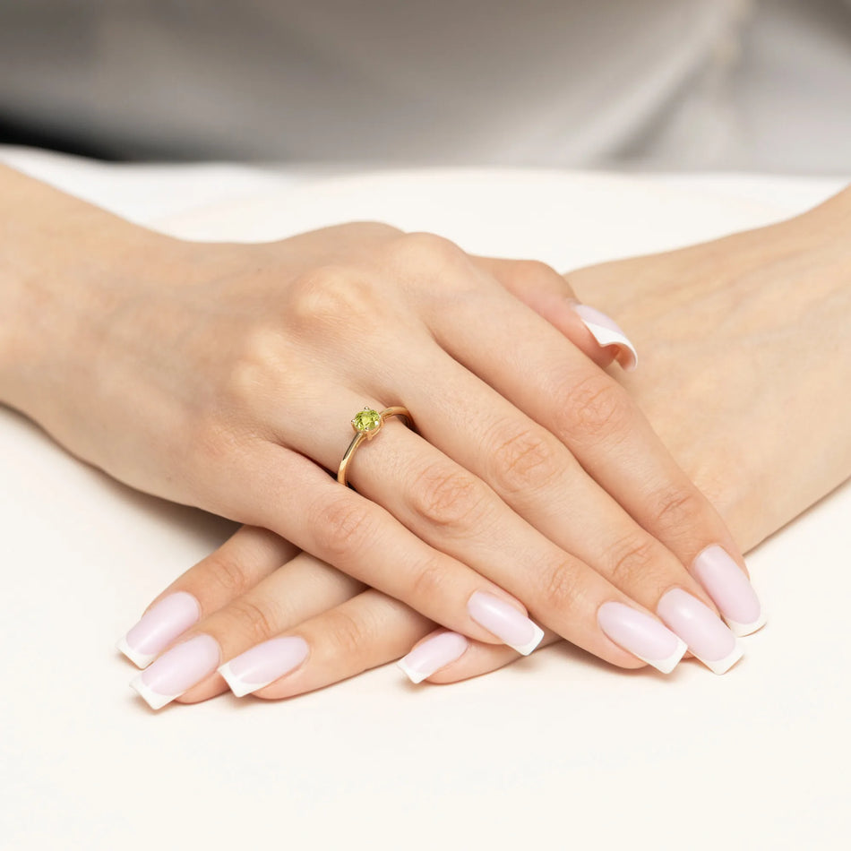 Zlatý prsteň s olivínom 0,60 ct