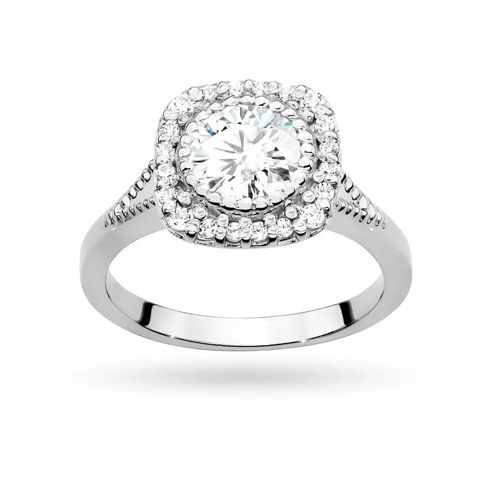 Zlatý prsteň s diamantom 0,70 ct a postrannými diamantmi 0,196 ct