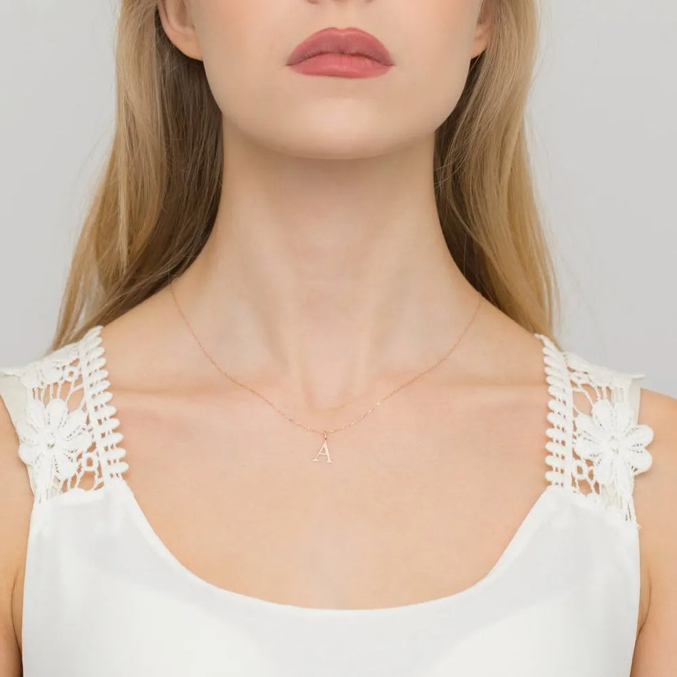 Gold Pendant with Diamonds Letter A