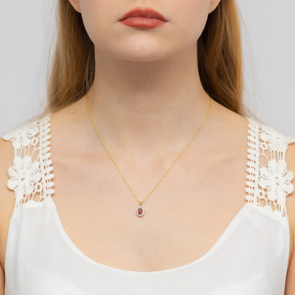 Gold Pendant with 0.50ct Garnet and 0.12ct Diamonds