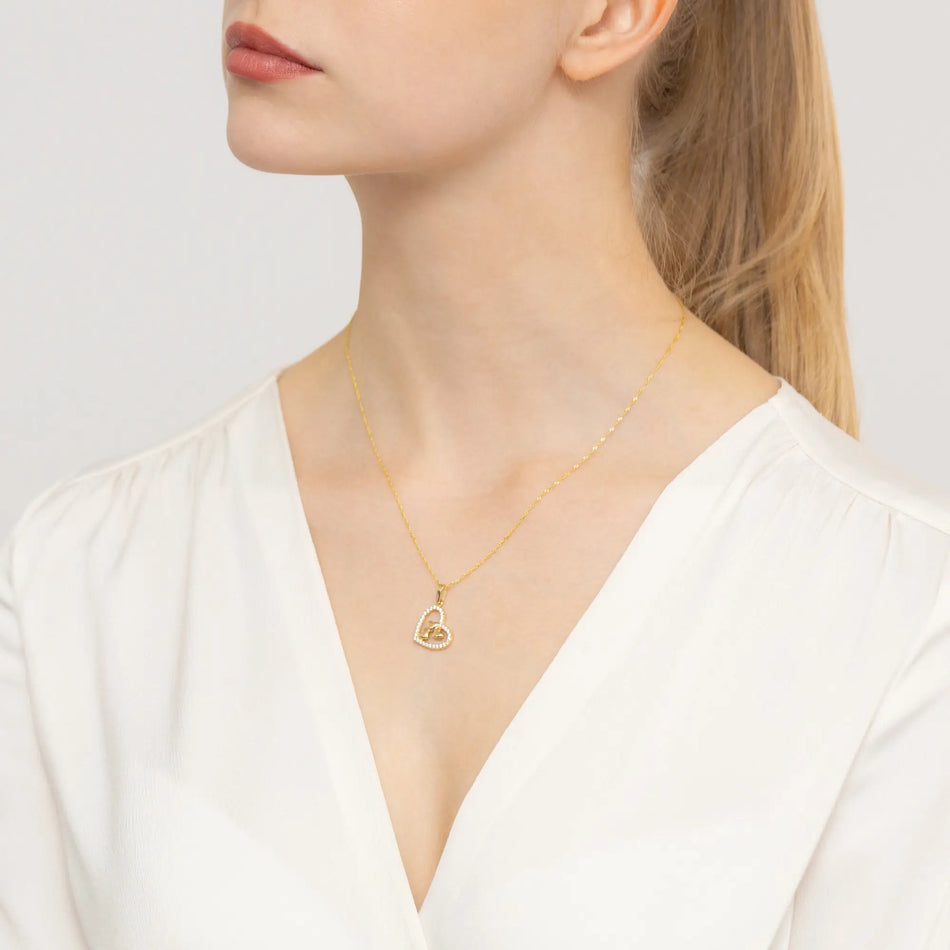Gold Pendant with Zirconia Three Hearts in a Heart